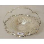 Edwardian silver cake basket with pierced swing handle, shaped pierced and fluted body on a pedestal
