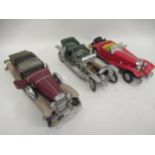 Group of three 1/24 scale diecast metal models of vintage cars