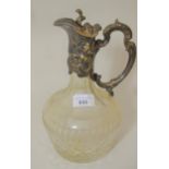 Cut glass claret jug with silver plated mounts, hinged cover and shaped handle Silver plating