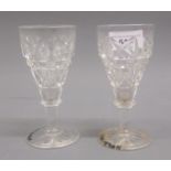 Pair of John Walsh pedestal glasses with cut decoration