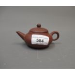 Yixing Chinese small terracotta teapot, signed with seal mark to base