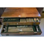 Walker & Hall silver plated Old English pattern canteen of cutlery, in an oak two drawer cabinet, on