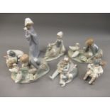Five various Lladro porcelain groups and figures together with two Nao figures