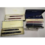 Two Sampson Mordan propelling pencils together with a quantity of fountain pens by Conway Stewart,