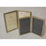 Mappin & Webb silver folding photograph frame, together with a similar smaller photograph frame Both