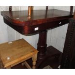 William IV mahogany rectangular fold-over tea table on a plain turned column support with