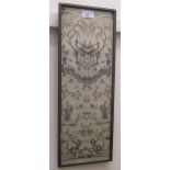 Pair of Chinese silkwork sleeve panels with figures housed in a single frame, 19ins x 6.5ins