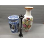 Reproduction Chinese blue and white pottery garden seat, together with a tall reproduction Chinese