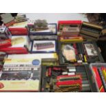 Large quantity of 00 gauge railway carriages, goods wagons and accessories, some in original boxes