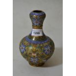 Chinese cloisonne baluster form vase with all over floral decoration, 7ins high