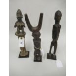 Group of three African native fertility figures Catapult 30cm Spiral twist column 32cm tall Other