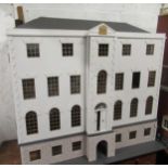 Large modern dolls house modelled on the Queen Mary dolls house with ten rooms flanking a central