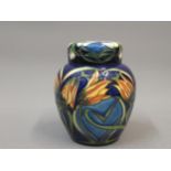 Modern Moorcroft ginger jar and cover decorated with tulips, dated 2004, 6ins high It is in good