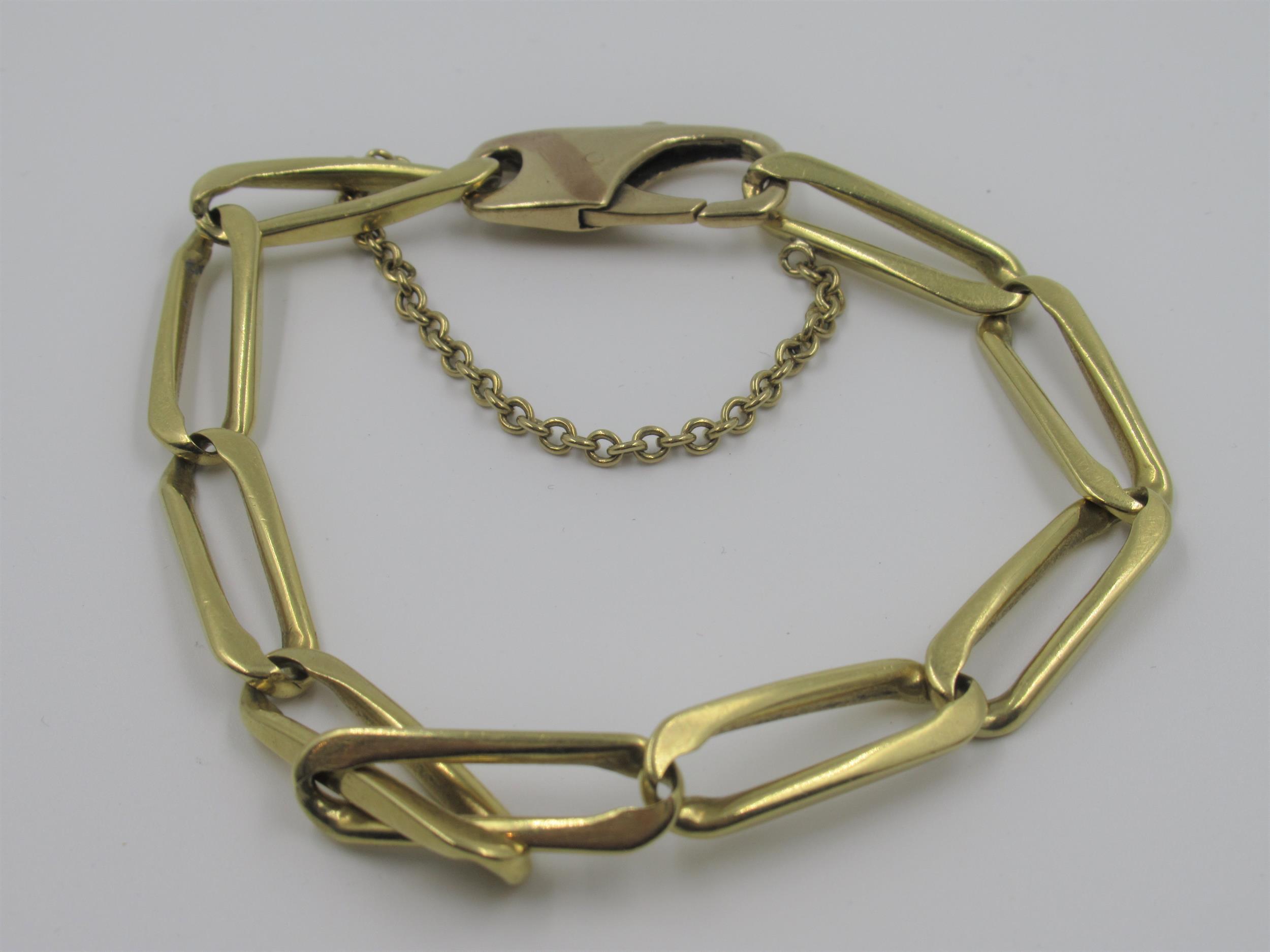 Heavy unmarked modern yellow metal bracelet with oval elongated links, 37g