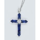 18ct White gold pendant cross set sapphires and diamonds The cross is 35mm high 25mm wide
