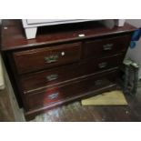 Edwardian mahogany chest of two short and two long drawers with brass handles and bracket feet,