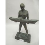 20th Century brown patinated bronze figure of a man holding a model ship, on a rectangular marble