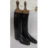 Pair of black leather riding boots with wooden trees Size UK 7-7.5 No measurements in boot Top of