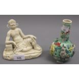 20th Century Oriental porcelain figure of a reclining man, with character marks to back and a