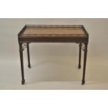 Good 19th Century mahogany silver table of Chippendale design, the rectangular galleried top above a