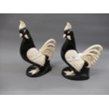 Pair of French Art Deco pottery figures of cockerels, 12ins high Crazing to both figures, one beak