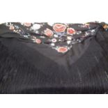 20th Century embroidered shawl on black ground 144cm x 136cm Generally in good condition