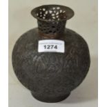 Small brown patinated Eastern baluster form vase, with cast floral decoration, 5.5ins high