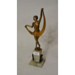 Art Deco gilded spelter figure of a girl dancer on an alabaster and black slate plinth, 13.5ins high