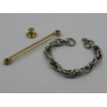 9ct Gold bar brooch, an 18ct gold dress stud and white metal bracelet 18ct ring - 0.7g 9ct ring - 4g