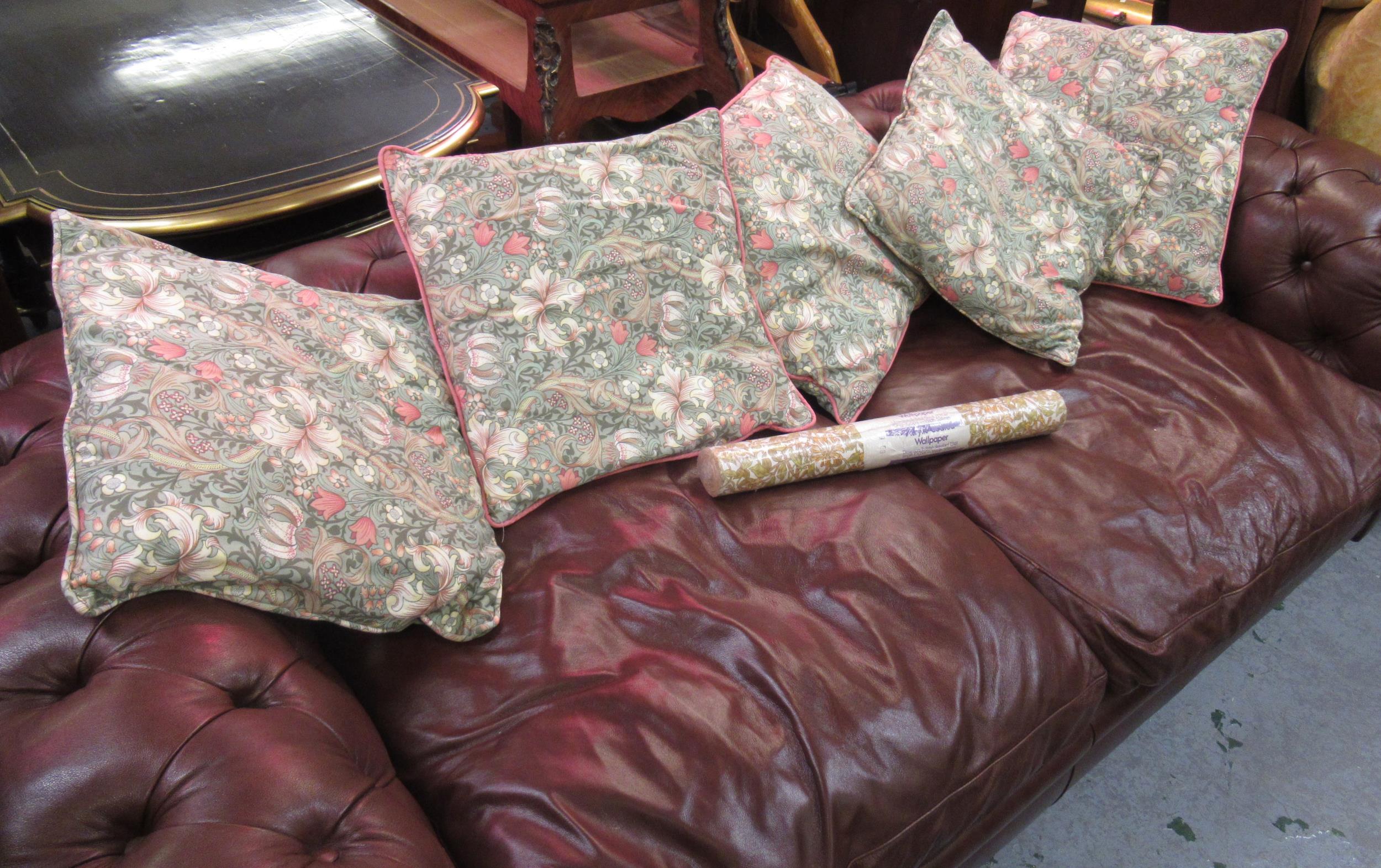 Five William Morris square cushions, golden lily design, together with a roll of vintage Sanderson