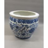 Chinese porcelain blue and white jardiniere / fish bowl decorated with an all-over floral design,