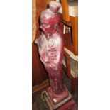Red patinated concrete garden of an oriental figure