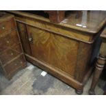 Victorian mahogany side cabinet, the moulded top above two doors and a plinth base, raised on low