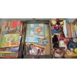 Three boxes containing various TV related toys and comics