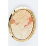20th Century 9ct gold mounted cameo brooch carved with a portrait of a girl in profile, 45mm x