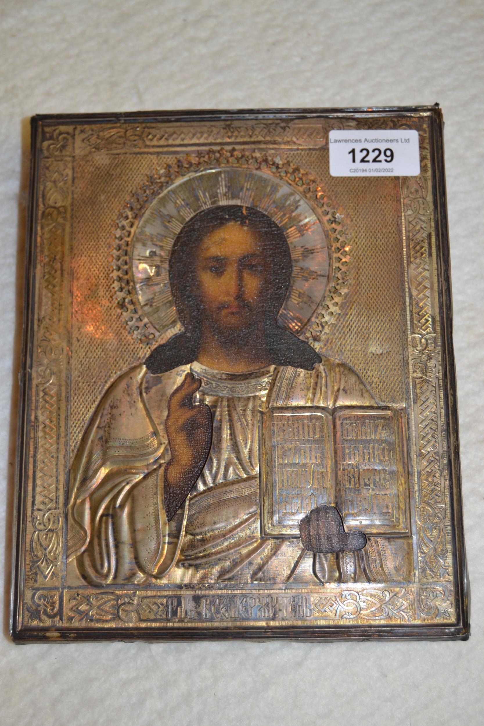 Late 19th / early 20th Century Russian silver mounted icon depicting Christ holding the Bible, 8.