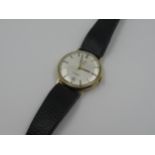 Gentleman's Rotary circular 9ct gold cased wristwatch on a black leather strap