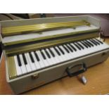 Scarla Regina portable electric organ in fitted case, 26.5ins high