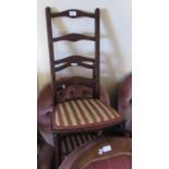 Pair of early 20th Century mahogany ladderback low seat chairs