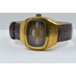 Sicura gentleman's gold plated automatic jump hour wristwatch on brown leather strap Currently