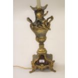 19th Century French gilded metal table lamp mounted with a cherub