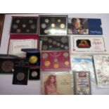 Small quantity of various Royal Mint proof coins in original packages and presentation boxes