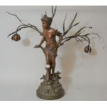 Late 19th / early 20th Century patinated spelter twin light figural table lamp in the form of a semi