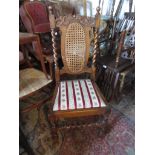 Set of four early 20th Century carved oak dining chairs with cane backs, barley twist uprights,