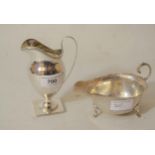 London silver pedestal cream jug in George III style, London silver sauce boat in George III