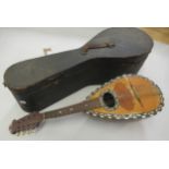Late 19th Century / early 20th Century Mandolin with ebony and mother or pearl decoration, in