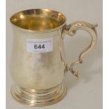 George III silver mug of plain baluster form with scroll handle, London 1770, 11oz No damage or