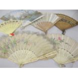 Three 19th Century pierced bone fans (with damages), together with a small quantity of other fans