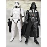 Two large late 20th Century Star Wars figures of a Stormtrooper and Darth Vader 30ins tall Some