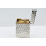 Silver plated Dupont lighter with engine turned decoration